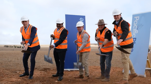 Men starting to build a new battery at a wind farm